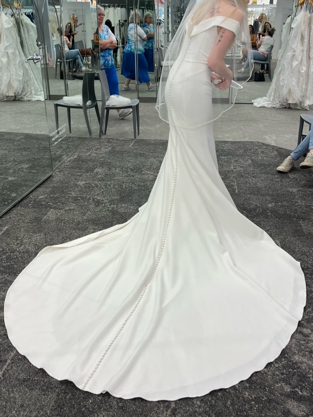Elegant Off-Shoulder White Bridal Gown with Sweep Train